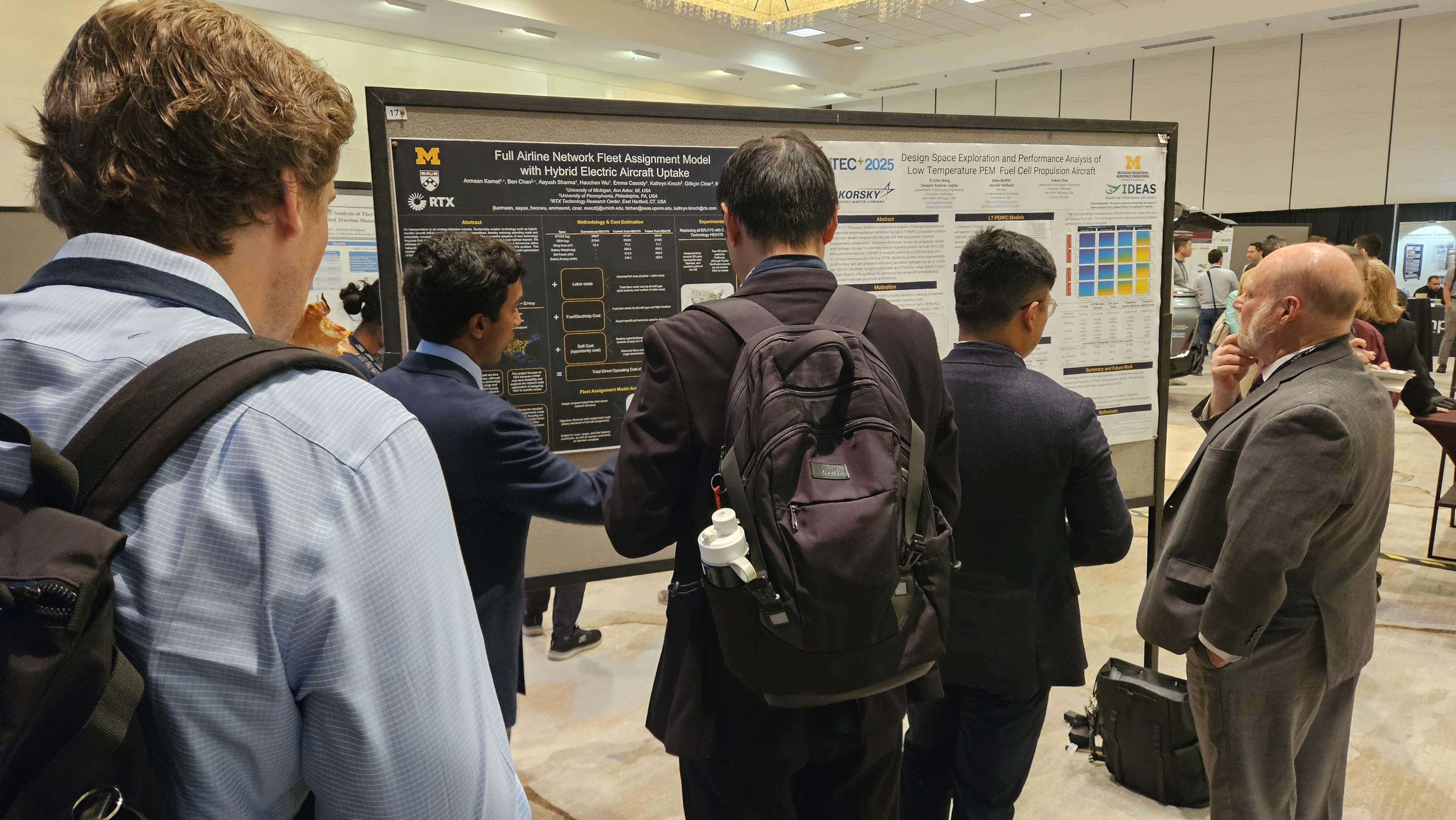 Armaan Kamat (left) and Yi-Chih Wang (right) presenting their posters.